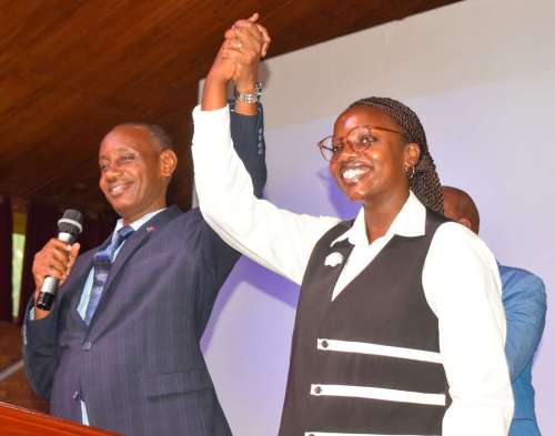 UCU New Guild President Agira and the Vice-Chancellor, Prof. Mushengyezi share a photo moment