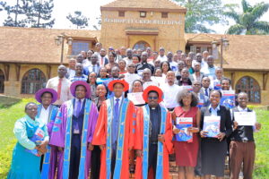 Graduates pose with Uganda Christian University leadership during the Certificate in Administrative Law graduation at the Bishop Tucker Building, Mukono, marking a milestone in ethical legal training.