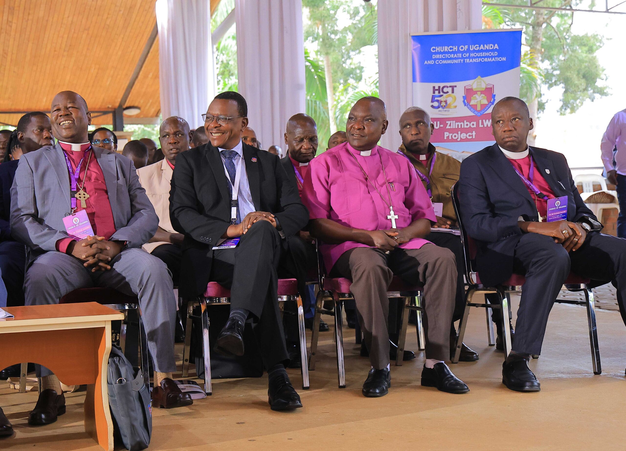 UCU Chairperson of the University Council, Prof. Alfred Olwa (L), Deputy Vice Chancellor of Finance and Administration, Mr. David Mugawe, (2nd L) with some of the Bishops in the audience during the Provincial Assembly Opening Ceremony. Photo by Andrew Bugembe.